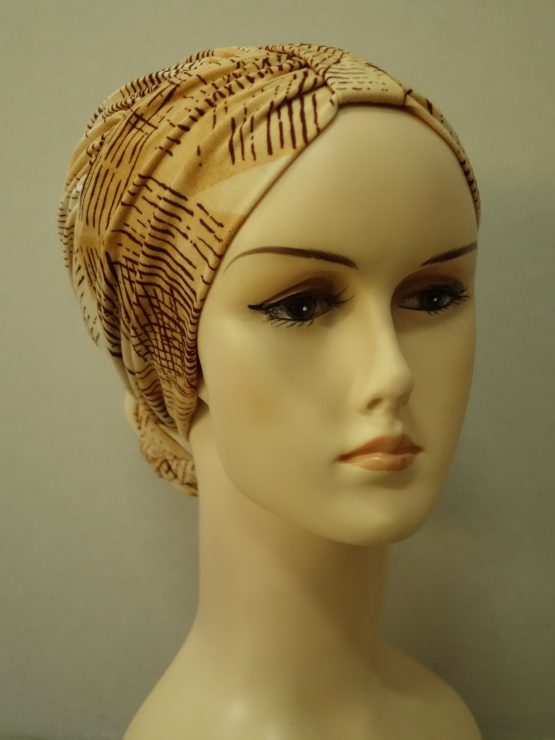 Beżowy drapowany turban we wzory